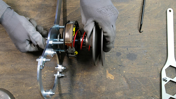 How do I fit the thrust spring?