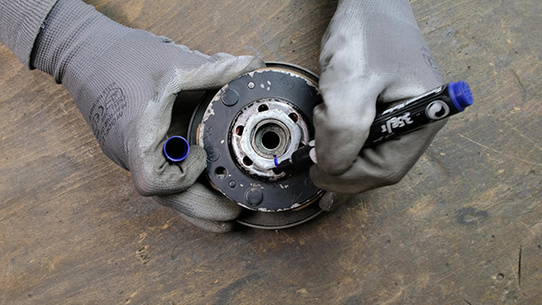 Mark the position of the clutch nut