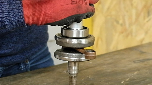 Place the bearing on the crankshaft